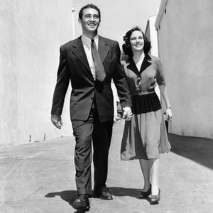 SHADOW OF A DOUBT, from left: Macdonald Carey, Teresa Wright, holding hands at Universal Studios, 1943
