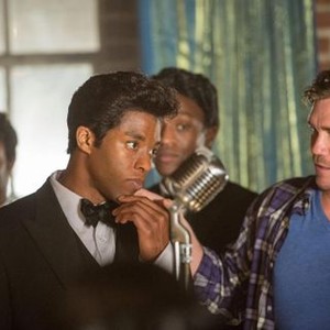 GET ON UP, from left: Chadwick Boseman, as James Brown, director Tate Taylor, on set, 2014. ph: D. Stevens/©Universal Pictures