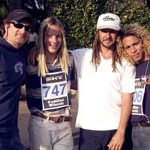 LORDS OF DOGTOWN, Stacy Peralta, John Robinson (who portrays Stacy in the film), Tony Alva, Victor Rasuk (who portrays Tony in the film) on set, 2005, © TriStar