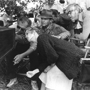 THE POSTMAN ALWAYS RINGS TWICE, director Bob Rafelson, Jessica Lange, Jack Nicholson, cinematographer Sven Nykvist watching playback on set, 1981, (c) Paramount