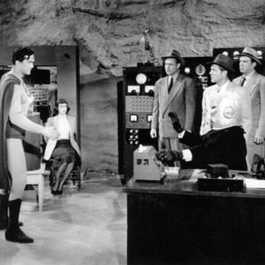 ATOM MAN VS SUPERMAN, from left: Kirk Alyn, Noel Neill, Terry Frost, Paul Stader, Lyle Talbot (sitting with helmet), Rusty Wescoatt, 1950