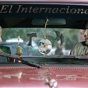 Laura Ramsey as Rachel and Jaime Camil as Alejandro in "Pulling Strings." photo 19