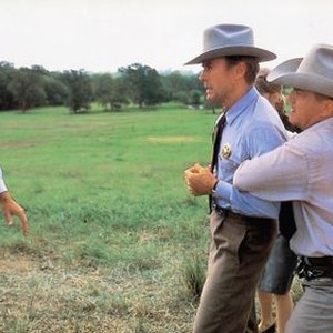 A PERFECT WORLD, Bradley Whitford (left), Clint Eastwood (center), Laura Dern (rear), Leo Burmester (right), 1993, © Warner Brothers