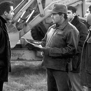 Stephen Fry (right) stars as Pinder, John Travolta (left) is attorney Jan Schlichtmann, and Dan Hedaya (center) is tannery owner John J. Riley. photo 12