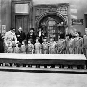 DADDY LONG LEGS, Elizabeth Patterson, (left), Warner Baxter, Louise Closser Hale, (back, second from right), 1931, TM and copyright ©20th Century Fox Film Corp. All rights reserved