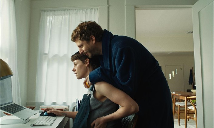 Glenn (Michael Cera) wants to know what his wife Rosie (Kristen Stewart) is doing, and she would like him to go away, in "Sacramento." (Vertical)