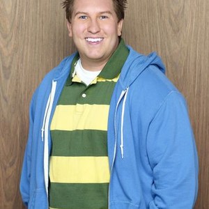 Nate Torrence as Roman
