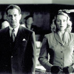 (From left to right) Tony Shalhoub stars as Freddy Riedenschneider and Frances McDomand stars as Doris Crane in the Ethan Coen and Joel Coen film, THE MAN WHO WASN'T THERE.