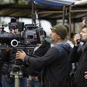 LUCY, director Luc Besson (center), on set, 2014. ph: Jessica Forde/©Universal Pictures