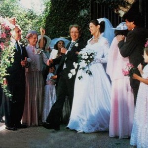 FOUR FRIENDS, arm in arm rear left: Miklos Simon, Elizabeth Lawrence, groom and bride center: Craig Wasson, Julia Murray, 1981, © Filmways