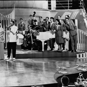 SHIP AHOY, Virginia O'Brien, Tommy Dorsey (trombone), Tommy Dorsey Orchestra, Buddy Rich (drums), Joe Bushkin (piano), Jo Stafford (female) and The Pied Pipers (behind piano), in front of piano: Connie Haines, Frank Sinatra, 1942