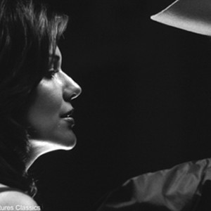 Laura Elena Harring as The Lady In Red and Bob Dylan as Jack Fate. photo 4