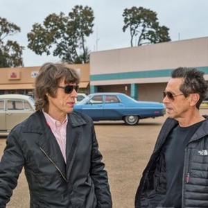 GET ON UP, from left: producers Mick Jagger, Brian Grazer, on set, 2014. ph: D. Stevens/©Universal Pictures