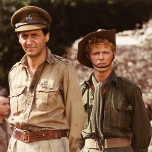 MERRY CHRISTMAS, MR. LAWRENCE, from left: Tom Conti, David Bowie, 1983. ©Universal