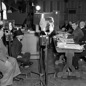 PARNELL, director John M. Stahl (in hat), Clark Gable filming on set, 1937