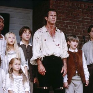 THE PATRIOT, l-r: Logan Lerman (front), Beatrice Bush (top), Mika Boorem (top), Skye McCole Bartusiak (front), Trevor Morgan, Mel Gibson, Bryan Chafin, Gregory Smith, Heath Ledger, 2000. ©Columbia Pictures