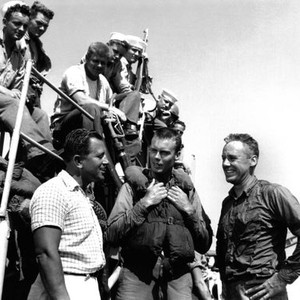 THE CAINE MUTINY, from left, front, director Edward Dmytryk, Robert Francis, Van Johnson, on location in Pearl Harbor, 1954