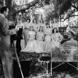 NINE GIRLS, Grady Sutton, Ann Harding, front, photographing Leslie Brooks, Lynn Merrick, Anita Louise, Ann Harding, Evelyn Keyes, Nina Foch, Marcia Mae Jones, Jinx Falkenburg, Jeff Donnell, Shirley Mills, 1944