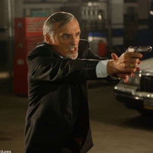 DENNIS HOPPER stars as Kaufman, a ruthless entrepreneur who controls the city of the living.