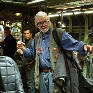 Writer/Director GEORGE A. ROMERO (right) returns to the genre he pioneered with "George A. Romero's Land of the Dead." JOHN LEGUIZAMO (background) stars as Cholo