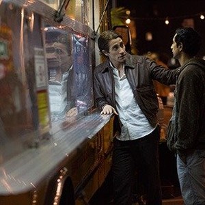 (L-R) Jake Gyllenhaal as Louis Bloom and Riz Ahmed as Rick in "Nightcrawler."