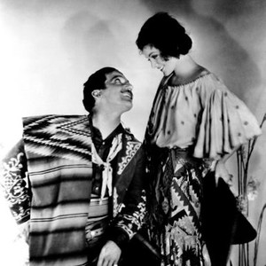 UNDER A TEXAS MOON, from left, Frank Fay, Myrna Loy, 1930