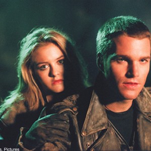 (L-R) Alicia Silverstone as Barbara and Chris O'Donnell as Dick in "Batman & Robin." photo 18