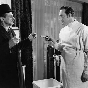 THE PEARL OF DEATH, from left, Miles Mander, Basil Rathbone, 1944