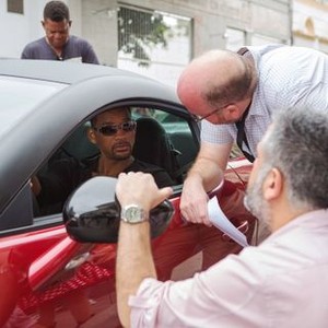 FOCUS, Will Smith (in car), director John Requa (back right), director Glenn Ficarra (front right), on set, 2015. ph: Frank Masi/©Warner Bros. Pictures