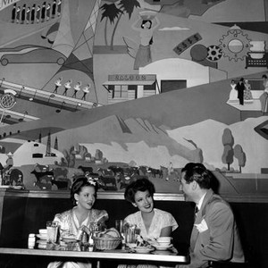 NOB HILL,  Vivian Blaine, Linda Darnell having lunch with Agent Manny Frank, 1945  TM & Copyright ©20th Century Fox Film Corp. All rights reserved