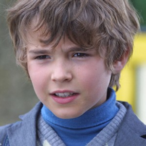 Thibault Verhaeghe as Young Julien in Paramount Classics' LOVE ME IF YOU DARE, directed by Yann Samuell. photo 20