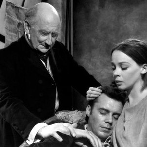 THE DOCTOR'S DILEMMA, from left: Felix Aylmer, Dirk Bogarde, Leslie Caron, 1958