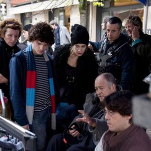 ME AND YOU, (aka IO E TE), Jacopo Olmo Antinori (striped shirt), Tea Falco (stocking cap), director Bernardo Bertolucci (sitting), on set, 2012, ©Emerging Pictures