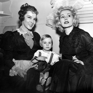 SO THIS IS LOVE, From left: Kathryn Grayson, her daughter Patricia Kathryn Johnston, and Zsa Zsa Gabor, on set, 1953