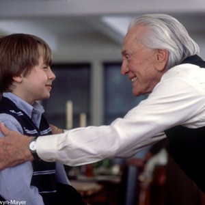 Mitchell Gromberg (KIRK DOUGLAS) greets his grandson, Eli (RORY CULKIN), in MGM Pictures' IT RUNS IN THE FAMILY. photo 14