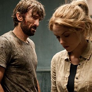 Sharlto Copley as John and Erin Richards as Sharon in "Open Grave." photo 20