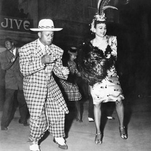 STAR SPANGLED RHYTHM, from left: Eddie 'Rochester' Anderson, Katherine Dunham, 1942