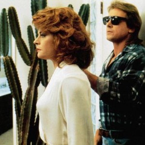 THEY LIVE, from left, Meg Foster, Roddy Piper, 1988, ©Universal