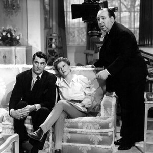 SUSPICION, Cary Grant, Joan Fontaine, and Alfred Hitchcock on the set, 1941