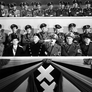 THE GREAT DICTATOR, first row, starting second from left: Carter DeHaven, Jack Oakie, Charlie Chaplin, Billy Gilbert, Henry Daniell, 1940