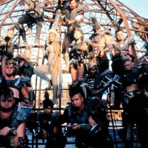 MAD MAX BEYOND THUNDERDOME, Tina Turner (middle), as Aunty Entity & her Thunderdome followers, 1985 (c)Warner Bros..