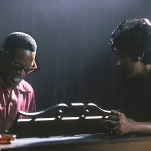 JAMIE FOXX as American legend Ray Charles and AUNJANUE ELLIS as vocalist Mary Ann Fisher in the musical biographical drama, Ray. photo 8