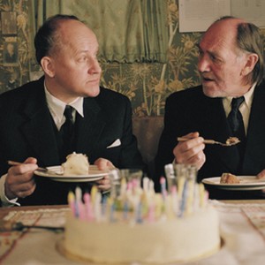 Joachim Calmeyer (Isak) and Tomas Norström (Folke) in a scene from KITCHEN STORIES directed by Bent Hamer. photo 12
