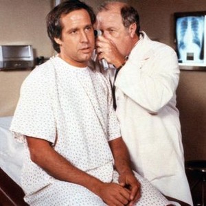 FLETCH, from left: Chevy Chase, E. Emmet Walsh, 1985.©Universal