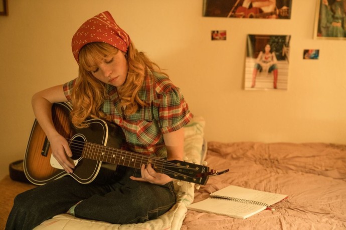 Penny Jo (Sydney Sweeney) prepares herself for Nashville in "Americana." (Lionsgate)