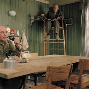 Joachim Calmeyer (Isak) and Tomas Norström (Folke) in a scene from KITCHEN STORIES directed by Bent Hamer. photo 13