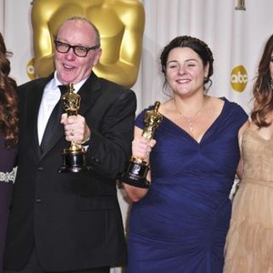 Maya Rudolph, Terry George, Oorlagh George, winners the Best Short Film Award for The Shore, Kristin Wiig in the press room for The 84th Annual Academy Awards - Oscars 2012 - Press Room 2, Hollywood  Highland Center, Los Angeles, CA February 26, 2012. Phot