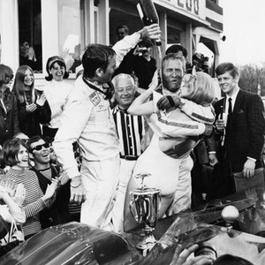 WINNING, Robert Wagner (holding bottle), Paul Newman (getting wet), Eileen Wesson (being embraced), 1969