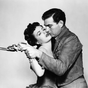 THE DUEL AT SILVER CREEK, from left, Faith Domergue, Stephen McNally, 1952