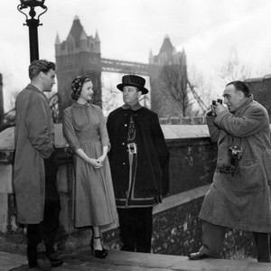 A RUN FOR YOUR MONEY, Donald Houston (far left), Moira Lister (second from left), still photographer James Jarche, on location, at the Tower of London, 1949